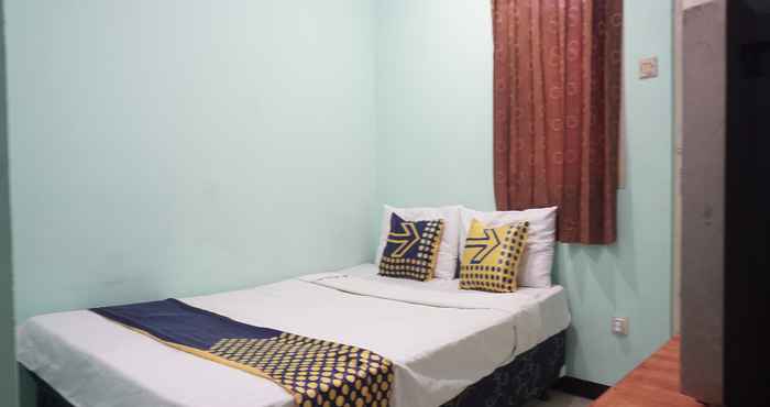 Bedroom SPOT ON 91860 Amazon Homestay Syariah 2