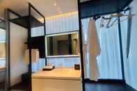 In-room Bathroom NewCC Hotel & Serviced Apartment