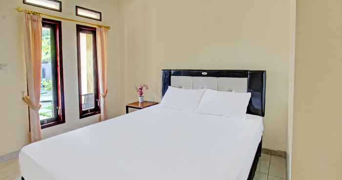 Bedroom OYO 91881 Aratha Homestay