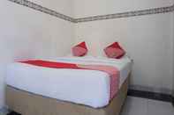 Kamar Tidur OYO 91900 Wisma Amrach