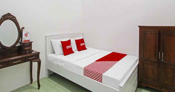 Kamar Tidur OYO 91817 Hotel Grand New Si Jago