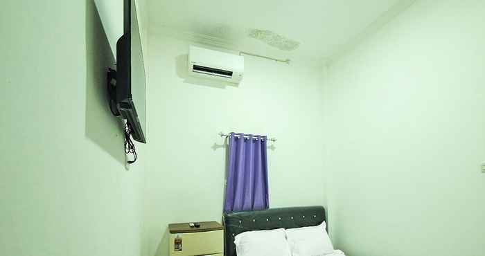 Kamar Tidur OYO 91895 Lovina Guest House