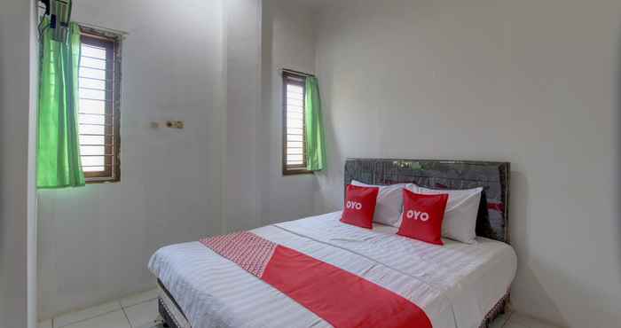 Kamar Tidur OYO 91690 Moza Guest House