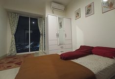Bedroom 2 Apartemen Grand Kamala Lagoon by Hana