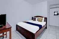 Kamar Tidur SPOT ON 91916 Joglo Doyong Homestay Syariah