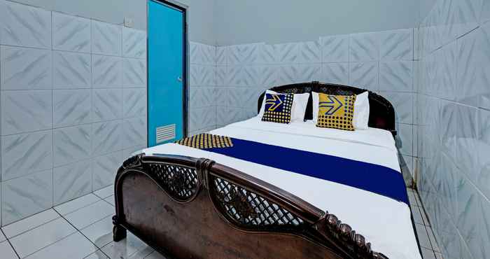 Kamar Tidur SPOT ON 91915 Homestay Superman