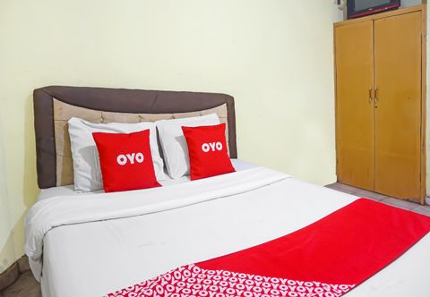 Kamar Tidur OYO 91766 Fortuna Hotel Syariah