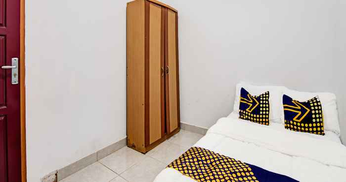 Kamar Tidur SPOT ON 91950 Guest House TekNong Syariah