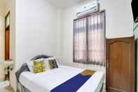 Kamar Tidur SPOT ON 91908 Hotel Wigati