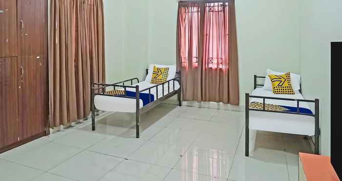 Kamar Tidur SPOT ON 91956 Kost Titian Zaman