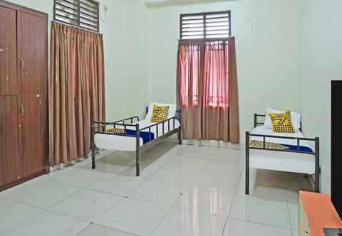 Kamar Tidur SPOT ON 91956 Kost Titian Zaman