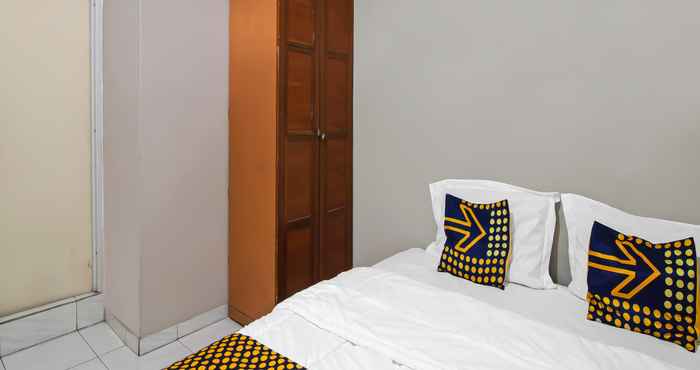 Bedroom SPOT ON 91958 Flamboyan 25 Homestay Syariah