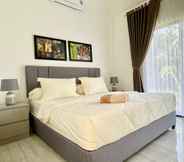 Bedroom 5 De Residence Pangandaran by Mabano Estates 