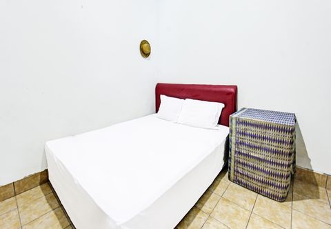 Bedroom SPOT ON 91982 Dani Homestay