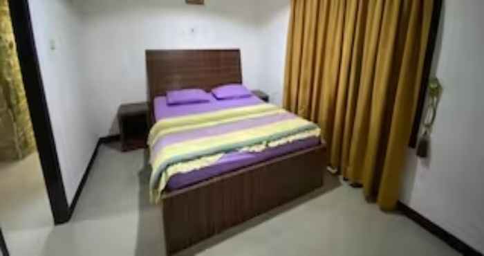 Kamar Tidur EXPRESS O 91923 Homestay Zona