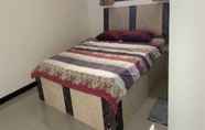 Kamar Tidur 5 EXPRESS O 91923 Homestay Zona