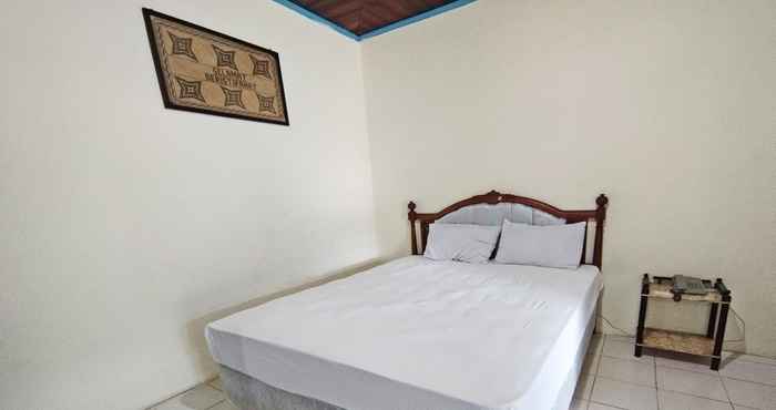 Kamar Tidur OYO 91973 Green Hotel