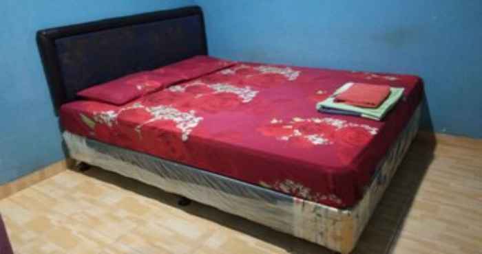 Bedroom EXPRESS O 91978 Mentari Homestay Malioboro