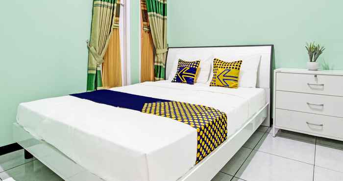 Kamar Tidur SPOT ON 92012 Homestay Grand Mahkota Permai Syariah