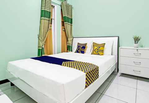 Bedroom SPOT ON 92012 Homestay Grand Mahkota Permai Syariah