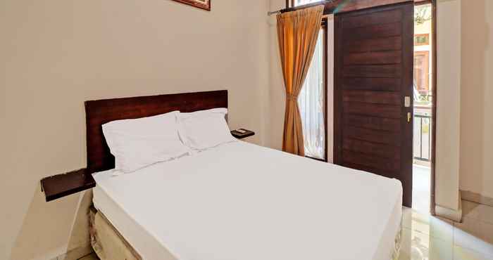 Kamar Tidur OYO 92017 Sari Agung Hotel