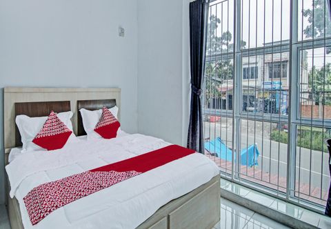 ห้องนอน OYO 92047 Penginapan Arfi Syariah