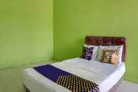 ห้องนอน SPOT ON 92031 Wisma Galung Syariah