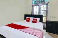 Kamar Tidur OYO 92059 Archi Homestay