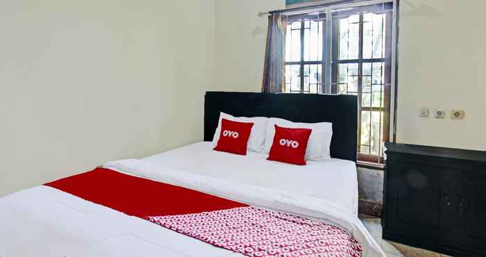 Bedroom OYO 92059 Archi Homestay