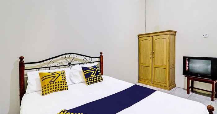 Kamar Tidur SPOT ON 92056 Asri Kost Syariah