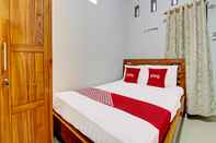 Kamar Tidur OYO 92071 Yusman Homestay Syariah