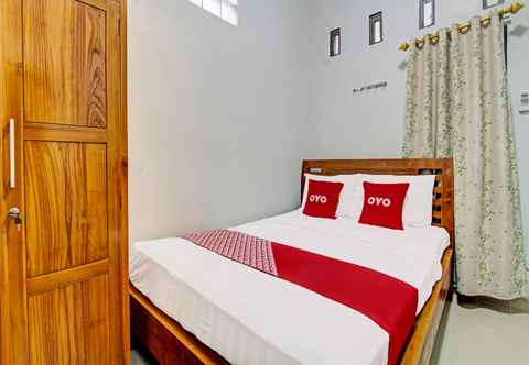 Kamar Tidur OYO 92071 Yusman Homestay Syariah