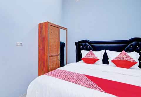 Bedroom OYO 92081 Malora Homestay