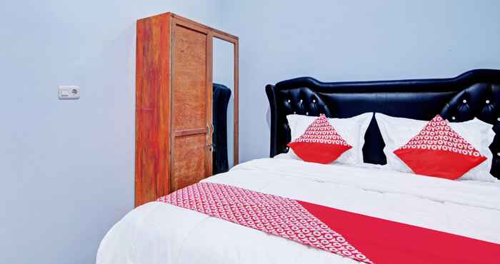 Kamar Tidur OYO 92081 Malora Homestay