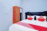 Bedroom OYO 92081 Malora Homestay