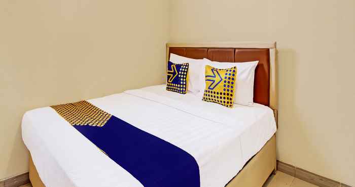 Kamar Tidur SPOT ON 92044 El Shaddai Guest House