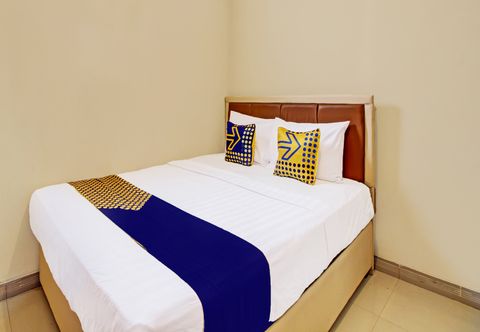 Bedroom SPOT ON 92044 El Shaddai Guest House