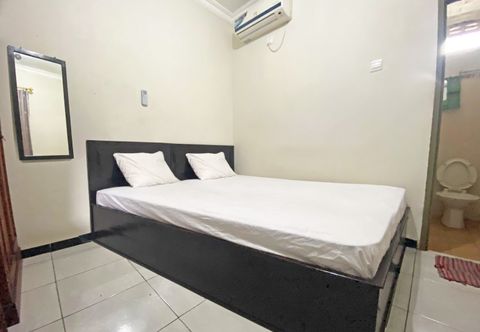 Bedroom SPOT ON 92042 Sumber Rejo Homestay
