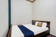 Kamar Tidur SPOT ON 92068 Pudja Kesuma Homestay Yogyakarta