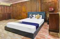 Bedroom SPOT ON 92083 Lailik Gilang Guesthouse