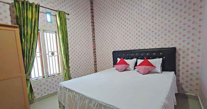 Bedroom OYO 92079 Anaqi Homestay Syariah