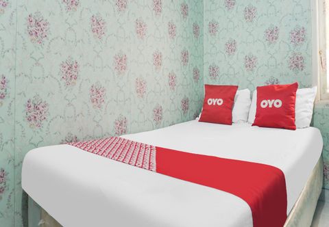 卧室 OYO 92110 Christine Home Stay Syariah