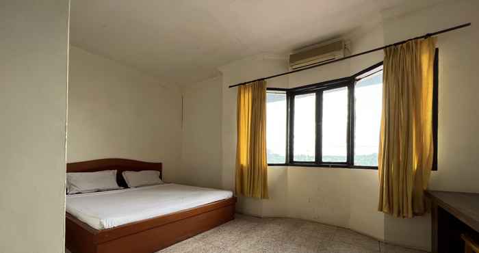 Kamar Tidur OYO 92098 Kost Orange Syariah