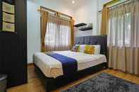 Phòng ngủ SPOT ON 92121 Mitra Dago Antapani Syariah