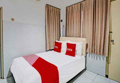 Kamar Tidur OYO 92124 Raya Permai Homestay Syariah