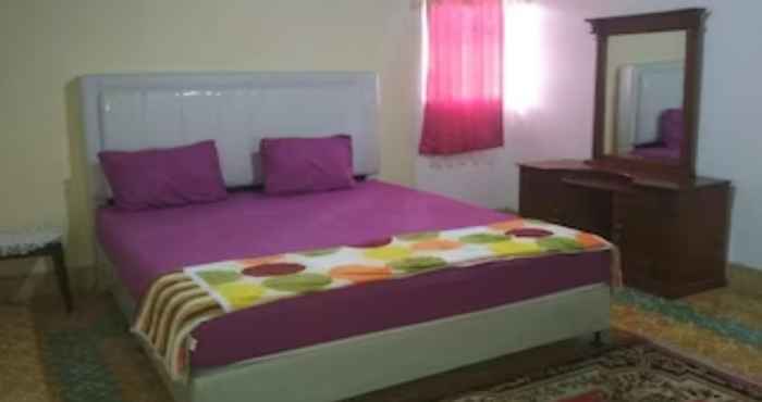 Bedroom EXPRESS O 92070 Mando Homestay Syariah