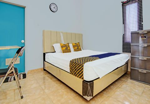 Bedroom SPOT ON 92141 Penginapan Cahaya Syariah