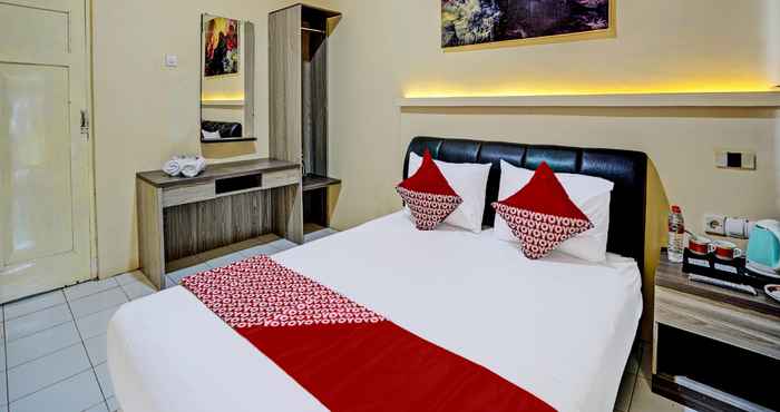 ห้องนอน Capital O 92162 Hotel Wisata Karya