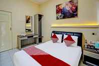 ห้องนอน Capital O 92162 Hotel Wisata Karya