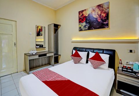 Bedroom Capital O 92162 Hotel Wisata Karya